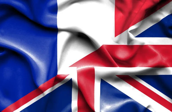 유나이티드 Kingdon와 프랑스의 국기를 흔들며 — 스톡 사진