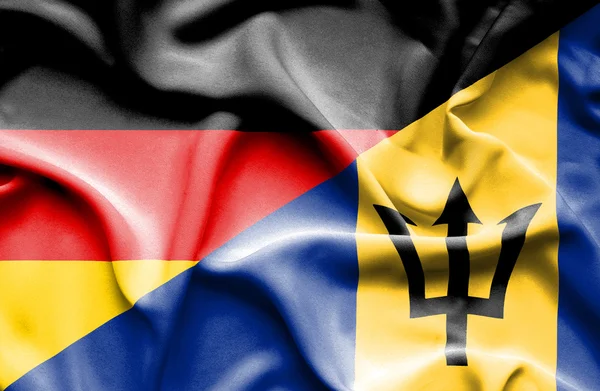 Mávání vlajkou Barbadosu a Německo — Stock fotografie