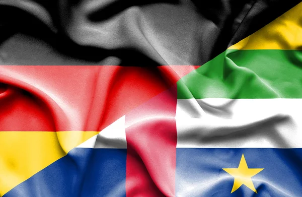 Flagge der Zentralafrikanischen Republik und Deutschlands geschwenkt — Stockfoto