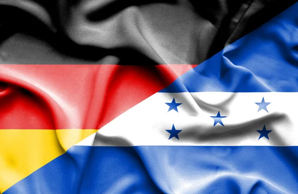 Waving flag of Honduras and Germany — Stock Photo, Image