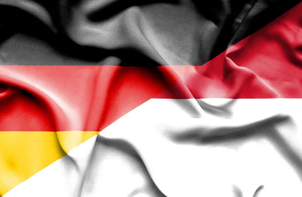 Wapperende vlag van Indonesië en Duitsland — Stockfoto