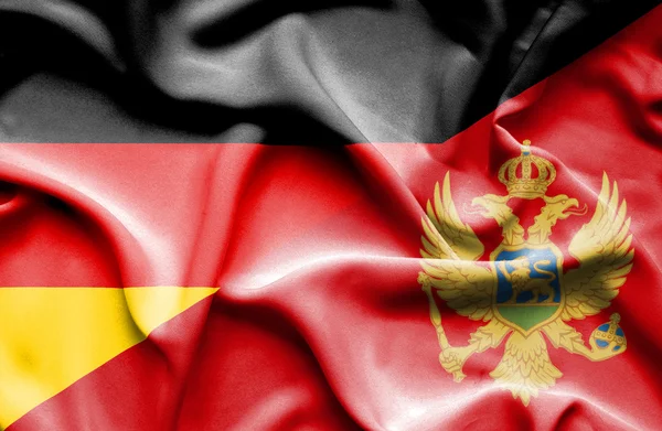 Waving flag of Montenegro and Germany — Stock Photo, Image