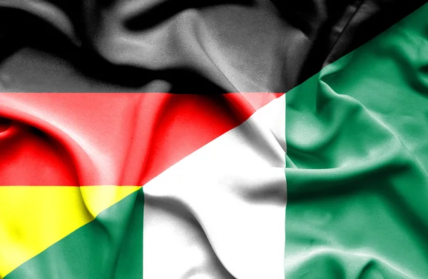 Flagge Nigerias und Deutschlands schwenken — Stockfoto