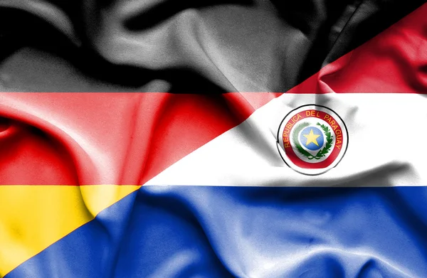 Waving flag of Paraguay and Germany — Stock Photo, Image