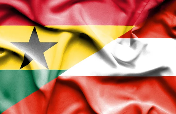 Bandiera sventolante di Austria e Ghana — Foto Stock