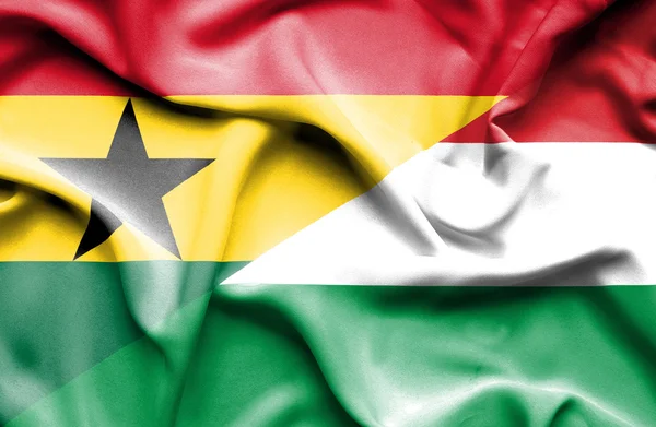 Fahne von Ungarn und Ghanas schwenkend — Stockfoto