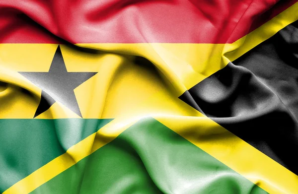 Sventolando bandiera della Giamaica e del Ghana — Foto Stock