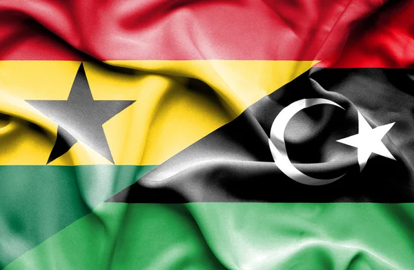 Flagge schwenkend von libya und ghana — Stockfoto