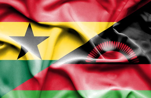 Flagge von Malawi und Ghanaschwenken — Stockfoto