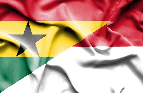 Viftande flagga Monaco och Ghana — Stockfoto