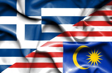 Malezya ve Yunanistan bayrağı sallayarak