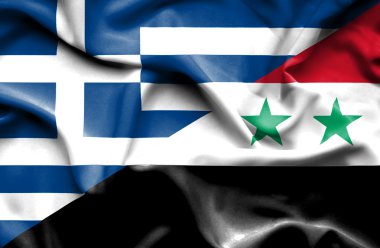 Suriye ve Yunanistan bayrağı sallayarak