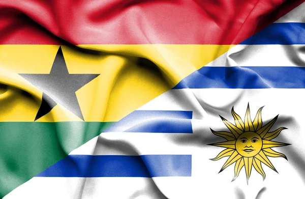 Uruguay och Ghana viftande flagga — Stockfoto