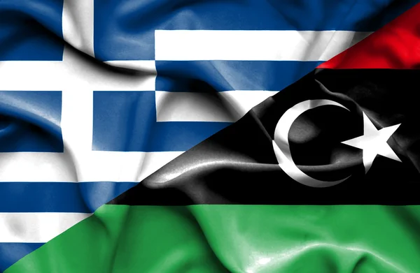 Mávání vlajkou Libye, Řecko — Stock fotografie