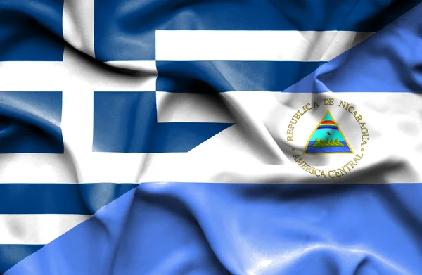 Wapperende vlag van Nicaragua en Griekenland — Stockfoto