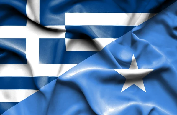 Waving flag of Somalia and Greece — Stock Photo, Image