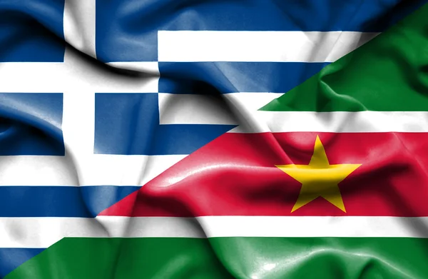 Waving flag of Suriname and Greece — Stock Photo, Image