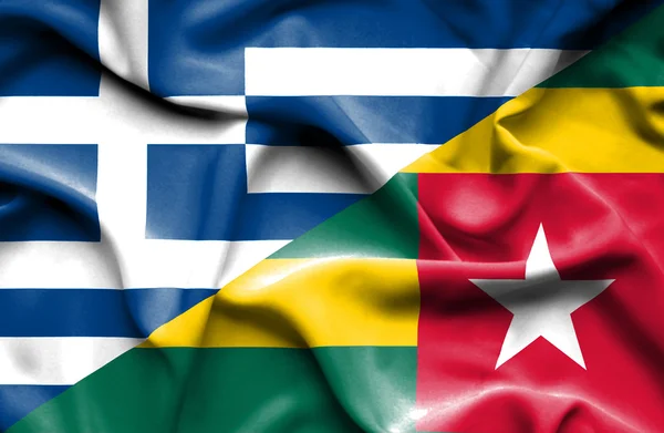 Bandeira acenando de Togo e Grécia — Fotografia de Stock
