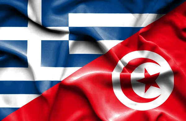 Waving flag of Tunisia and Greece — Stock Photo, Image