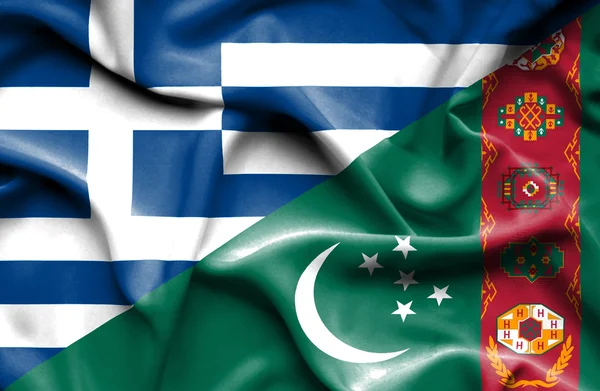 Waving flag of Turkmenistan and Greece — Stock Photo, Image