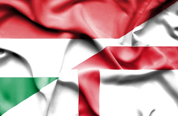 Waving flag of England and Hungary — Stock Photo, Image