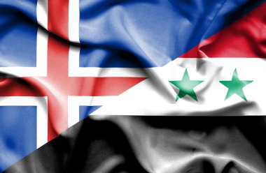 Suriye ve İzlanda bayrağı sallayarak