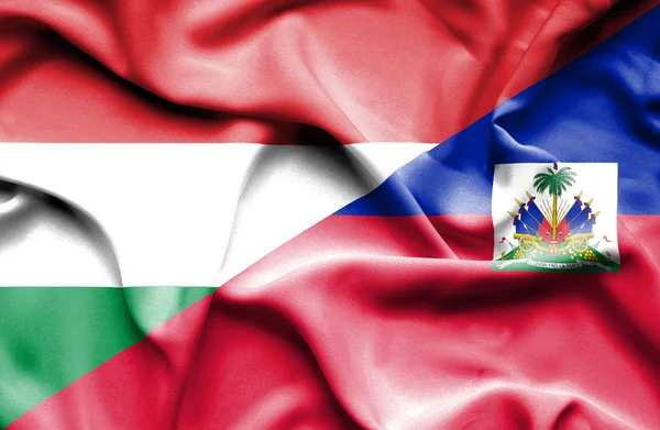 Vlající vlajka Haiti a Maďarsko — Stock fotografie
