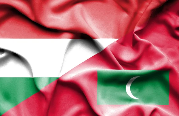 Wapperende vlag van de Maldiven en Hongarije — Stockfoto