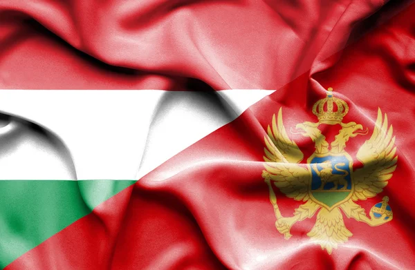 Montenegro och Ungern viftande flagga — Stockfoto