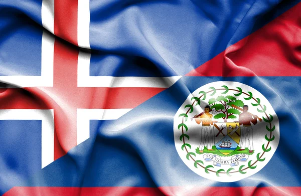 Flagge von Belize und Island schwenken — Stockfoto