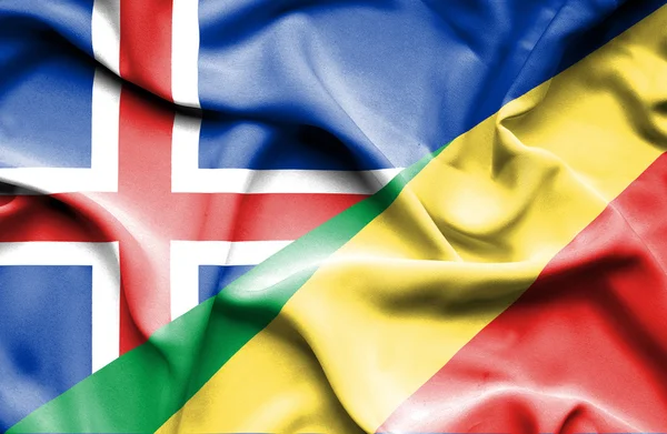 Kongo Cumhuriyeti ve İzlanda bayrağı sallayarak — Stok fotoğraf