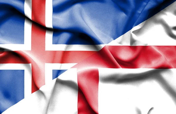 Vlající vlajka Anglie a na Islandu — Stock fotografie