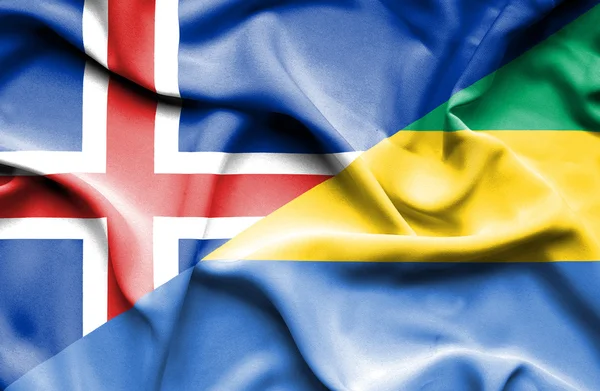 Gabon ve İzlanda bayrağı sallayarak — Stok fotoğraf