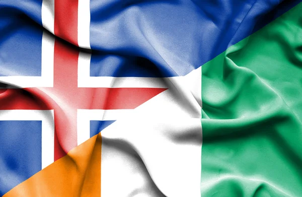 Bandiera sventolante della Costa d'Avorio e Islanda — Foto Stock