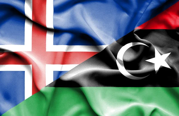 Libyen och Island viftande flagga — Stockfoto