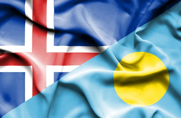 Mávání vlajkou Palau a Islandu — Stock fotografie
