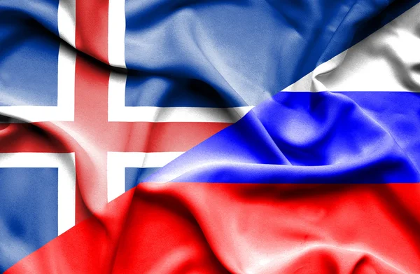 Viftande flagga Ryssland och Island — Stockfoto