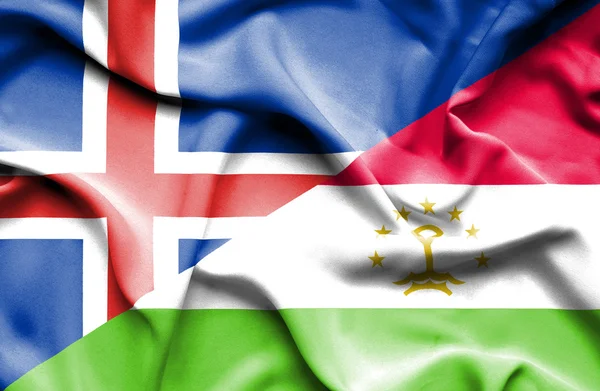 Waving flag of Tajikistan and Iceland — Stock Photo, Image