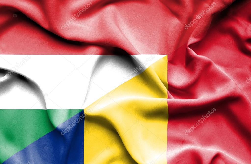 Waving flag of Romania and Hungary