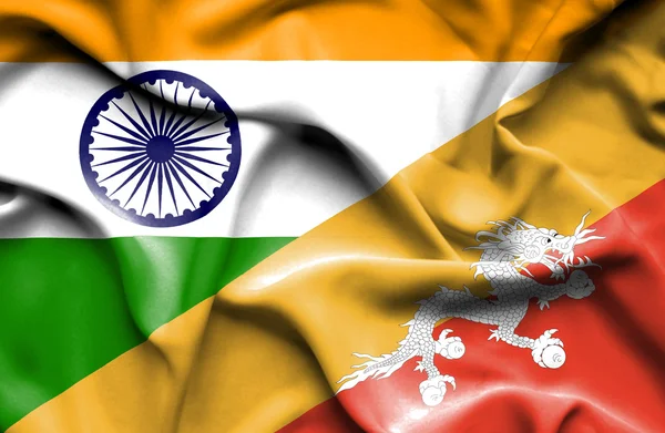 Bhutan och Indien vajande flagga — Stockfoto
