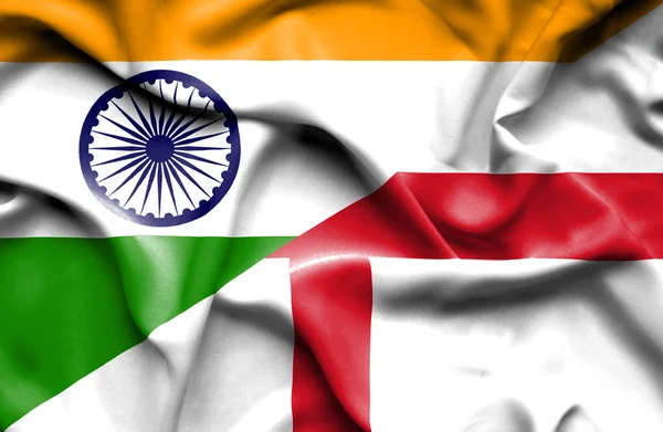 Sventolando bandiera di Inghilterra e India — Foto Stock