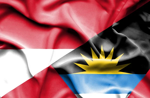 Waving flag of Antigua and Barbuda and Indonesia — Stock Photo, Image