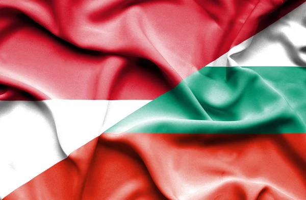 Wapperende vlag van Bulgarije en Indonesië — Stockfoto