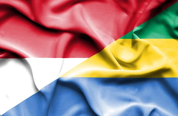 Waving flag of Gabon and Indonesia — Stock Photo, Image