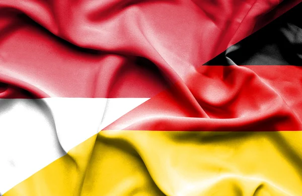 Waving flag of Germany and Indonesia — Stock Photo, Image