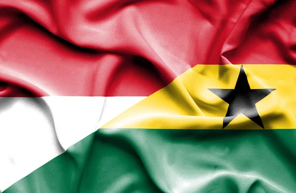 加纳和印度尼西亚那飘扬的旗帜 — 图库照片