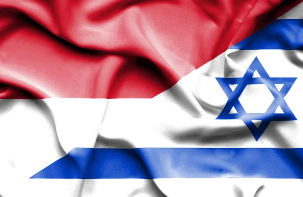 Waving flag of Israel and Indonesia — Stock Photo, Image