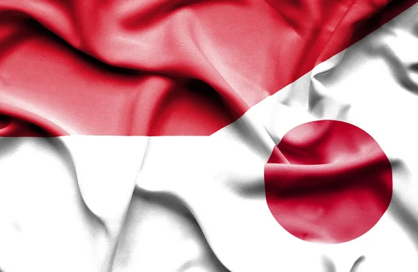 インドネシアと日本の旗を振ってください。 — ストック写真