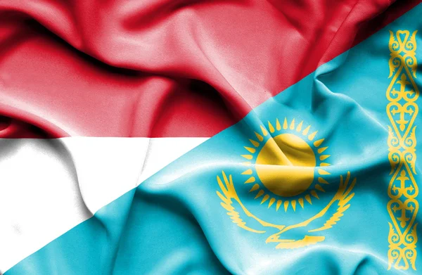 Waving flag of Kazakhstan and Indonesia — Stock Photo, Image