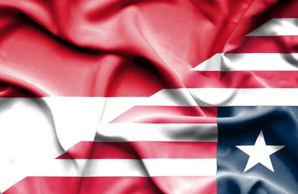 Flagge von Liberia und Indonesien schwenken — Stockfoto